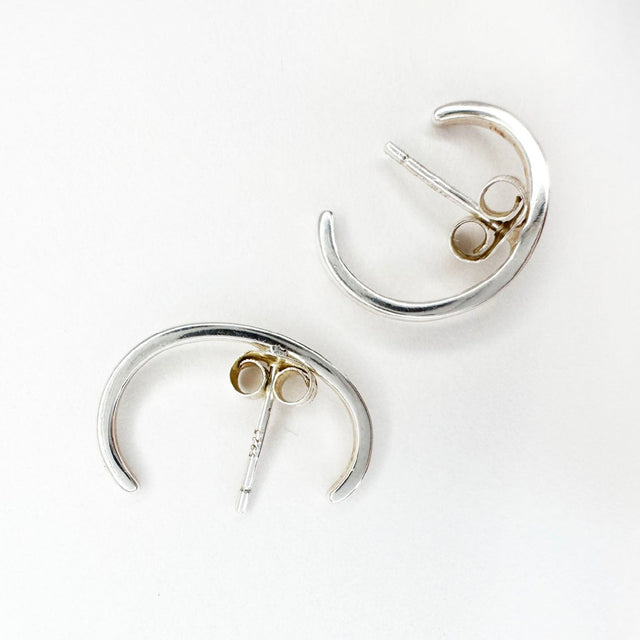 Sleek and stylish sterling silver ear cuff earrings, crafted with precision and designed to adorn your ears with effortless elegance. These chic earrings offer a modern twist to your ensemble, providing a chic and edgy statement.